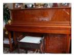 kAWAI k2 UPRIGHT PIANO. Beautiful piano in a Walnut....